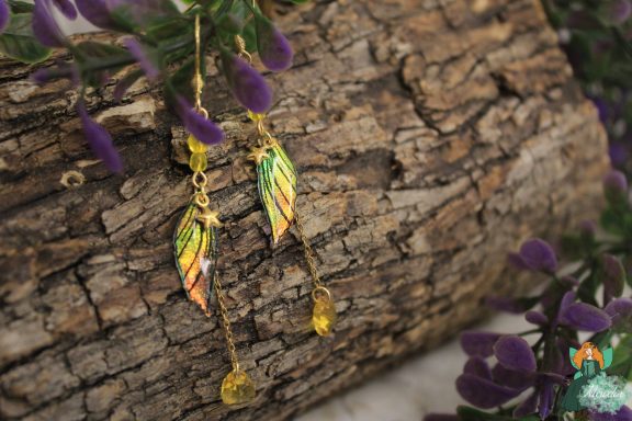 Boucles d'oreilles aile plume orange jaune avec perles ambre
