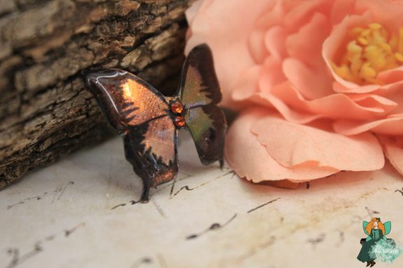 Broche papillon orange brun avec gemmes rouges