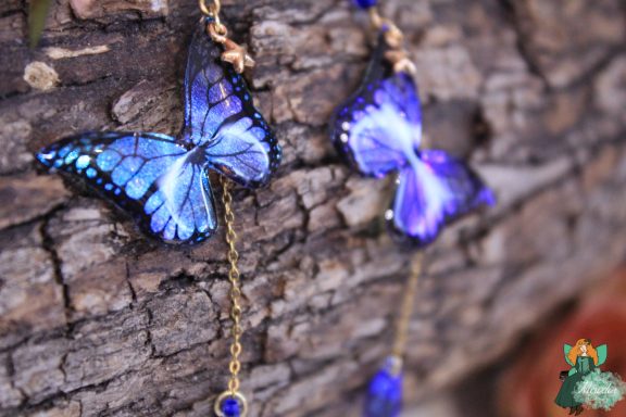 Boucles d'oreilles papillon bleu violet avec breloques etoiles