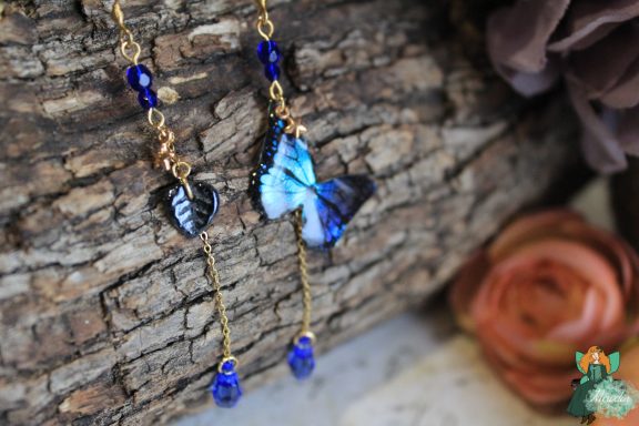 Boucles d'oreilles papillon bleu avec perles bleu fonce