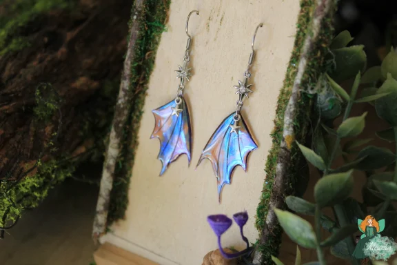 Boucles d'oreilles aile de dragon bleue avec puce etoile